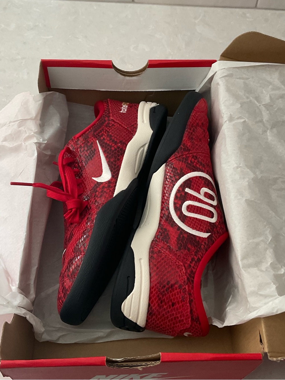 Nike Women’s Red Snake-Print Trainer with White Swoosh